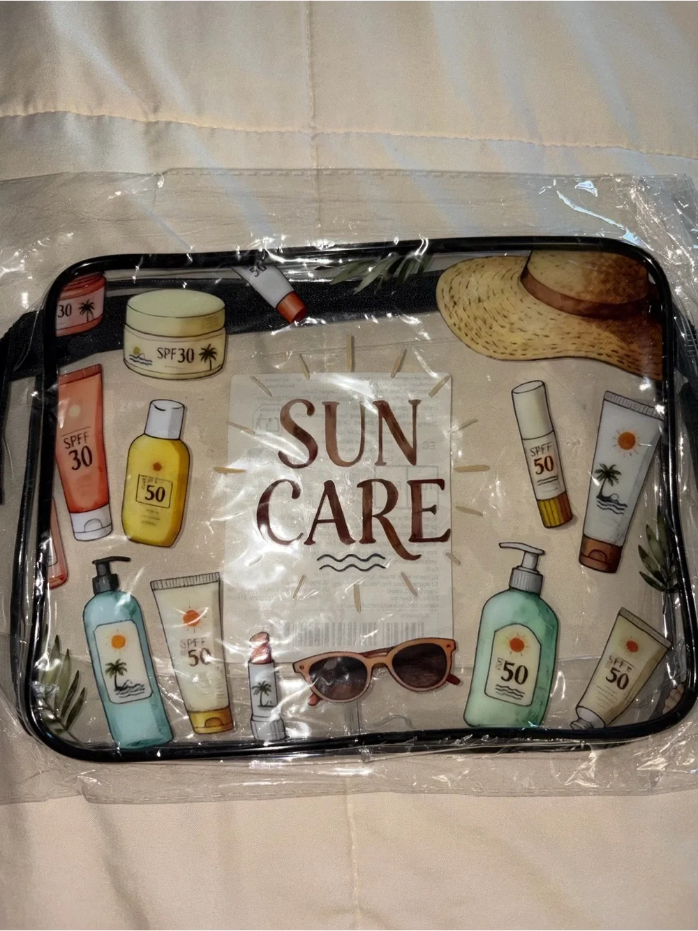 Clear Cosmetic Pouch with Beige and Tan Sun-Care Print